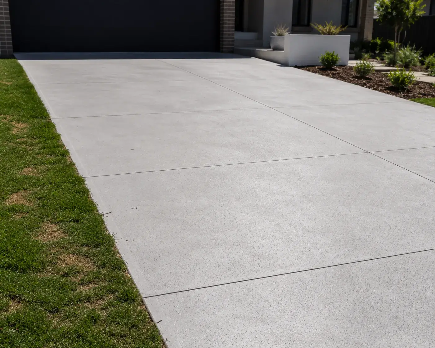 Close-up of a finished concrete driveway surface