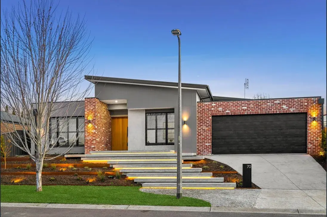 Reinforced concrete driveway leading up to a home